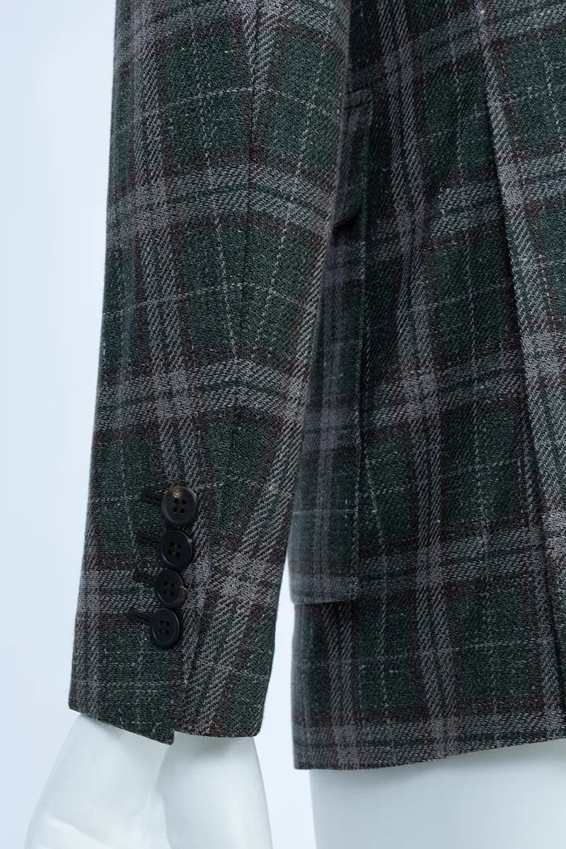 Plaid jacket on a mannequin against a white background slim fit blazers
