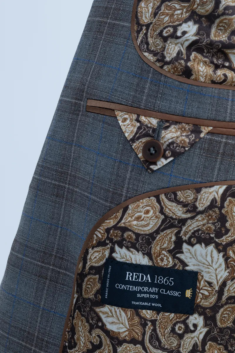 Close-up of a blue checkered suit with paisley patterns and a REDA 1865 italian wool blazer sport coat. miami tampa