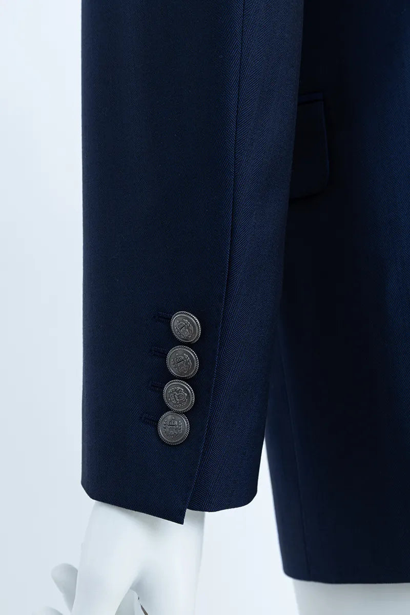 Navy blue blazer with silver buttons on a white background