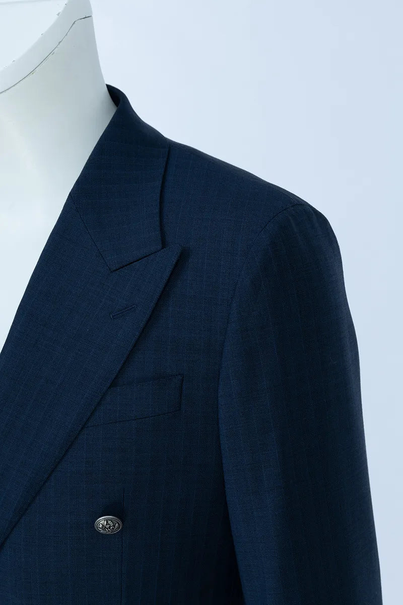 Navy blue suit jacket on a mannequin against a white background