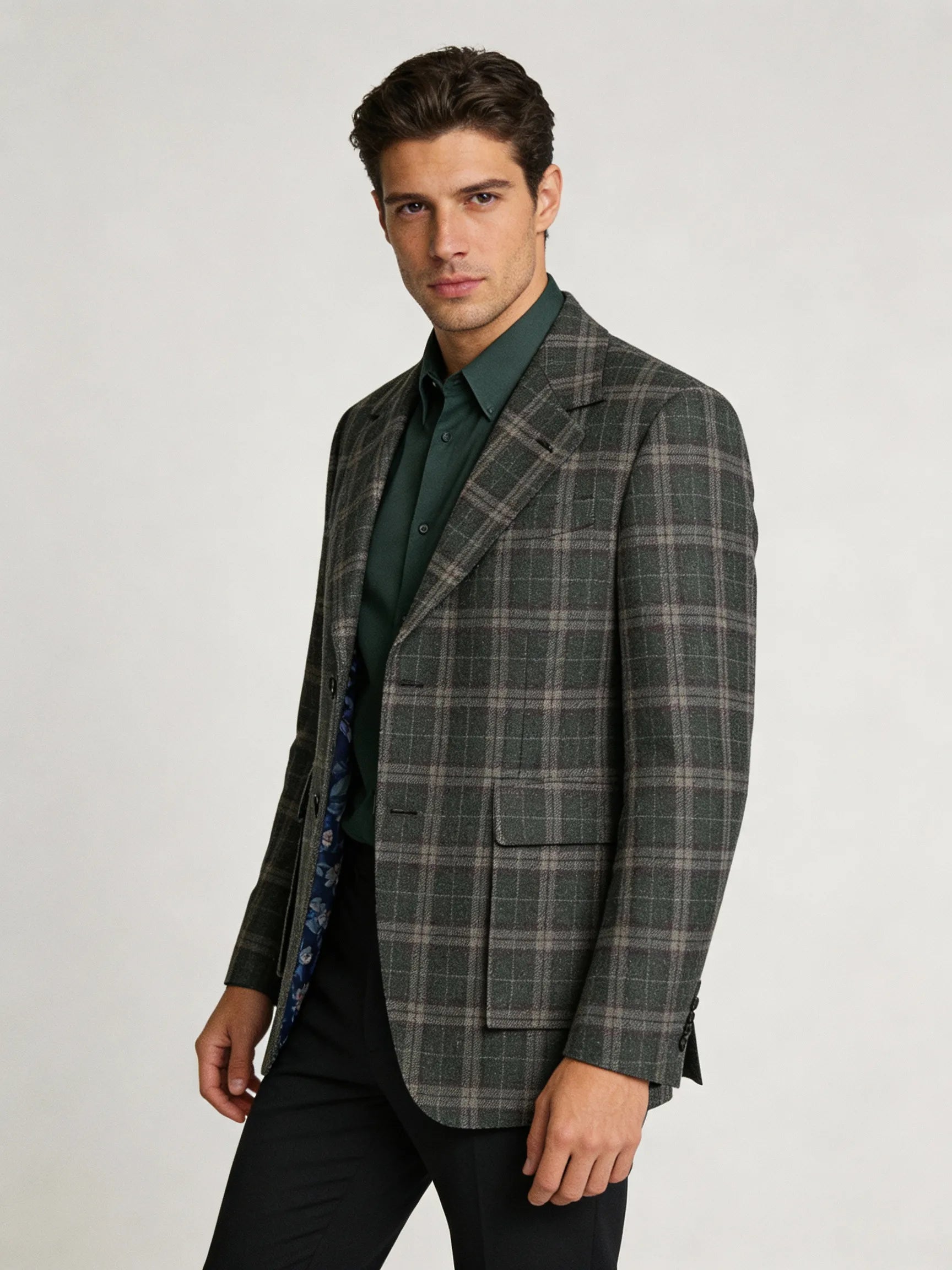Man wearing a plaid blazer over a green shirt sport coats custom made on sale near me, suits for business near orlando florida