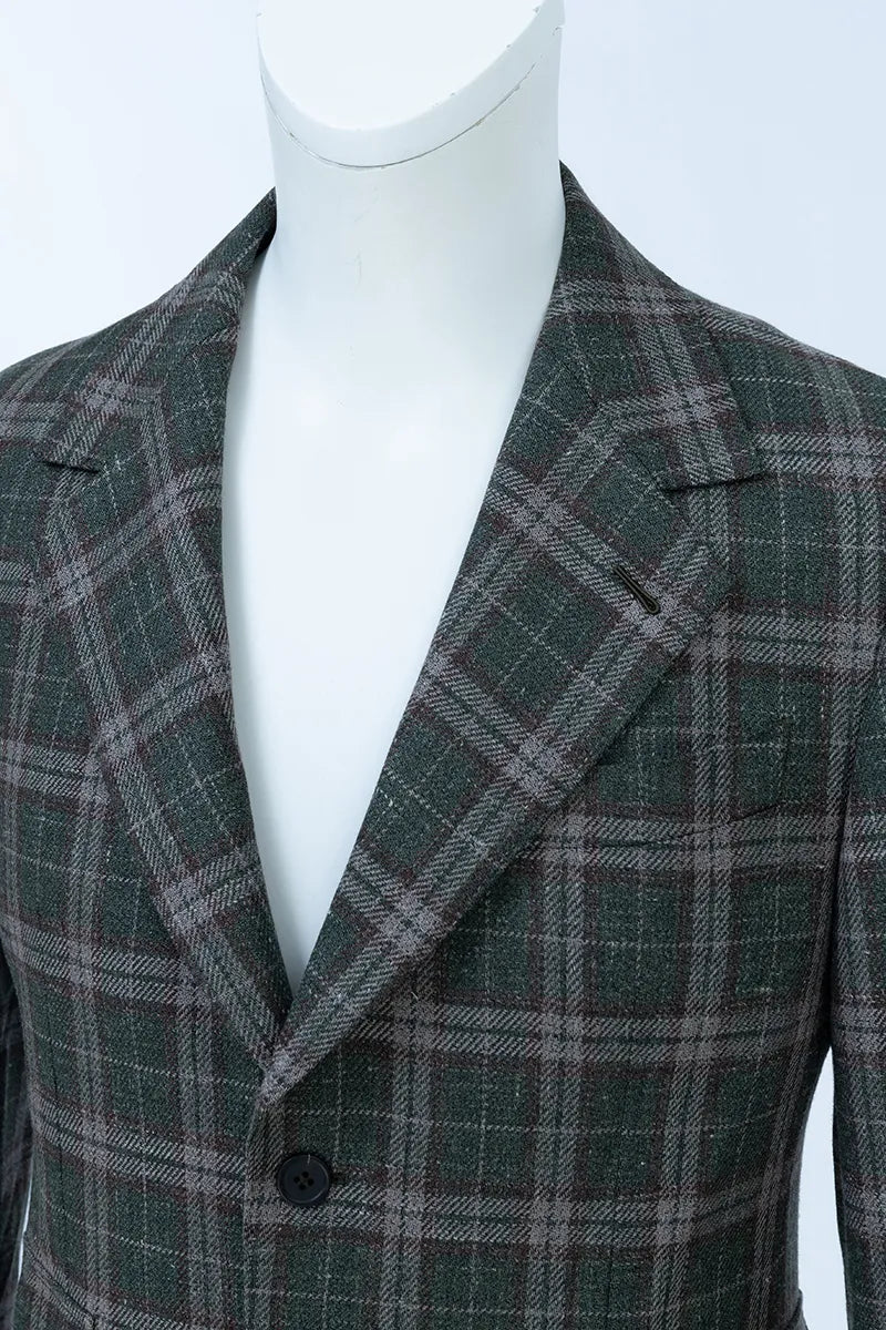 Green plaid blazer on a mannequin against a white background custom sport coats near me 