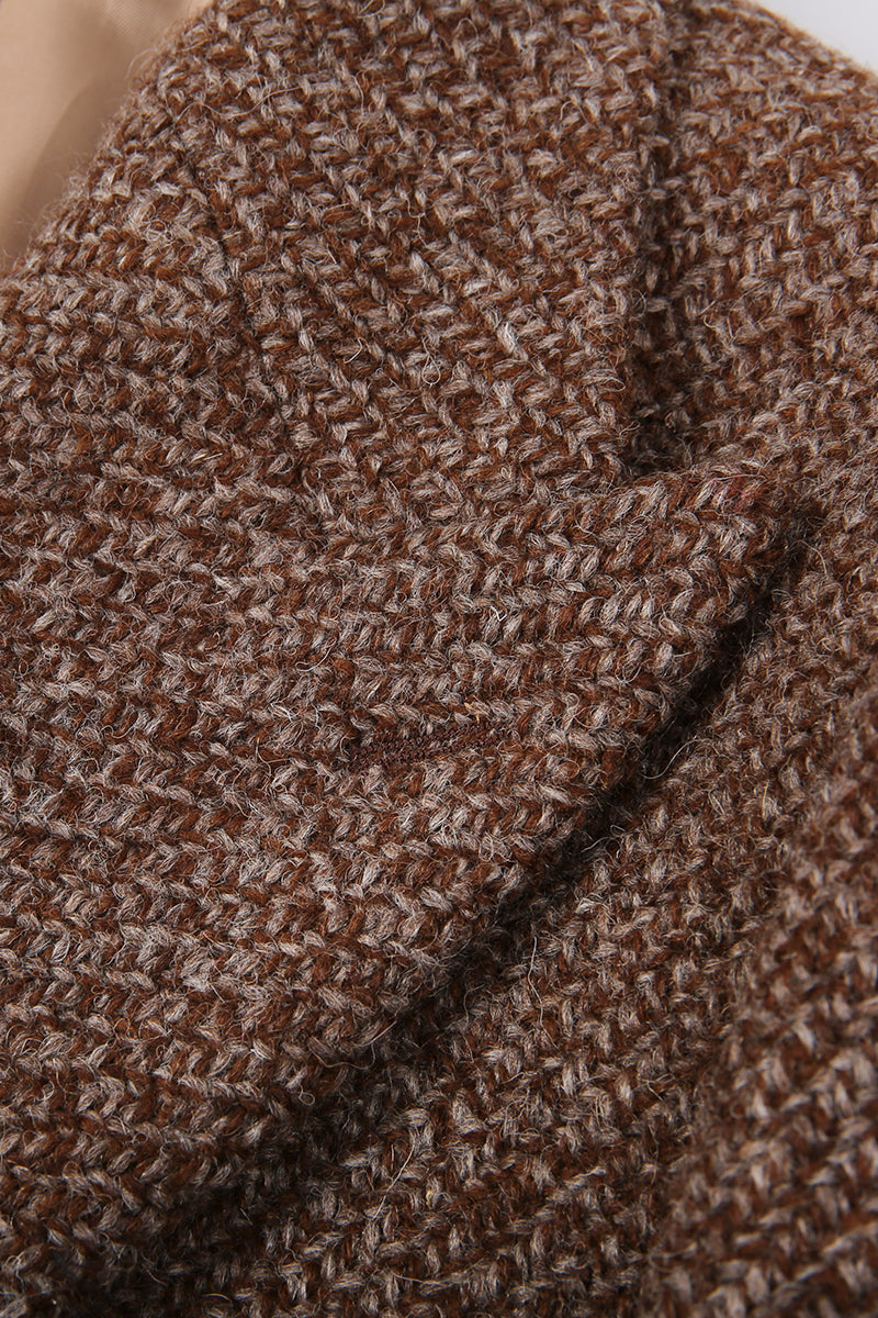 Close-up of brown herringbone fabric texture custom made jackets bespoke 