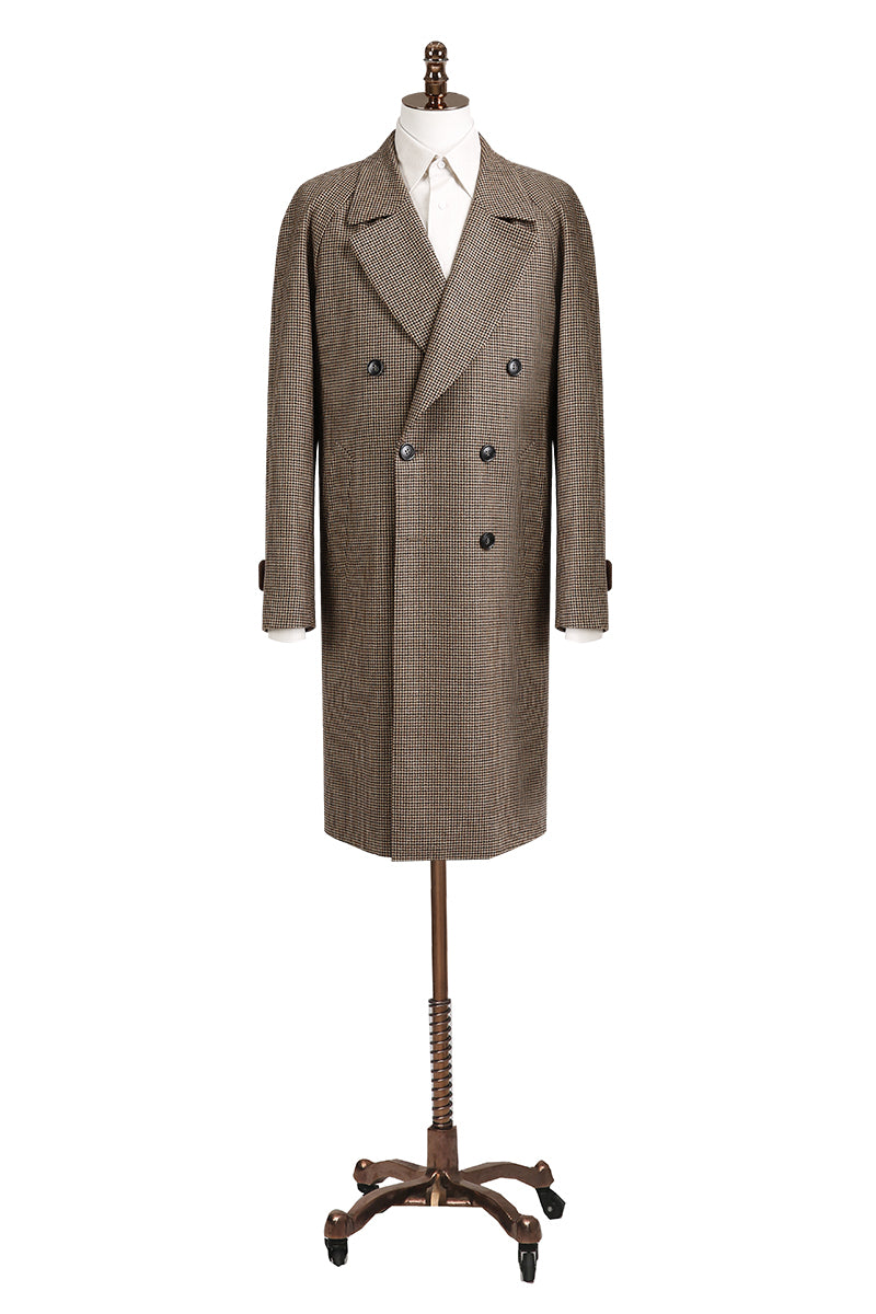 Brown checkered coat on a mannequin against a white background