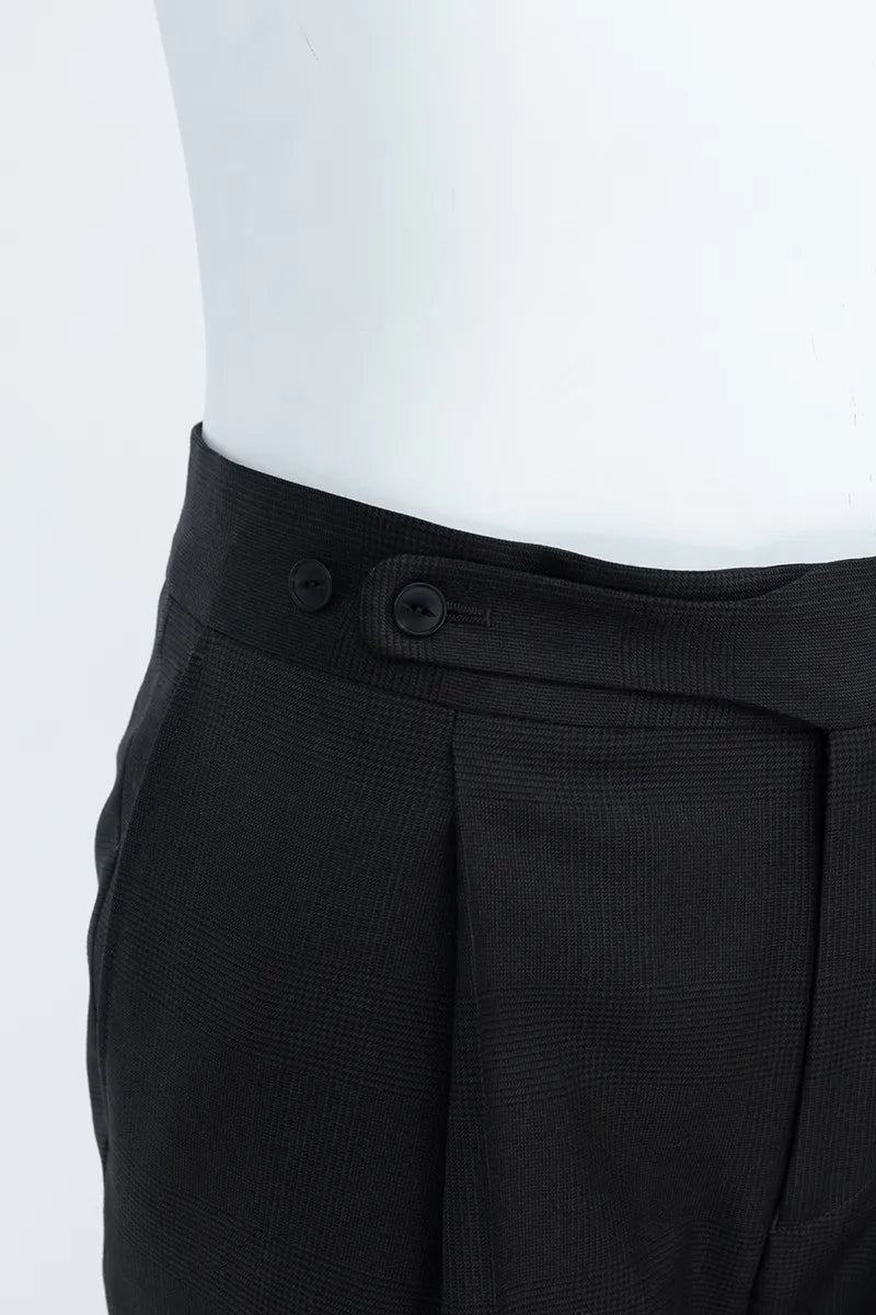 Black pleated pants on a white background pants with side adjuster buckle button 