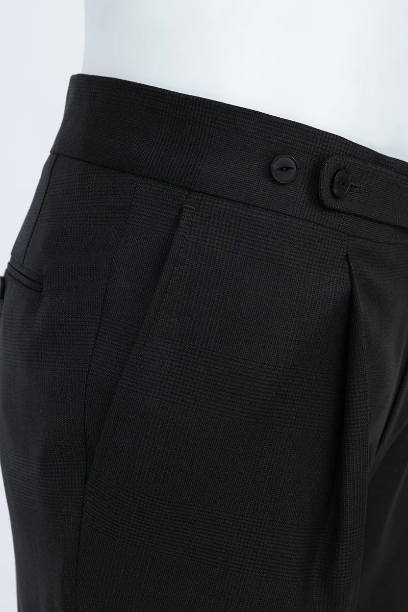 Close-up of black textured pants on a mannequin side adjuster pants italian style 