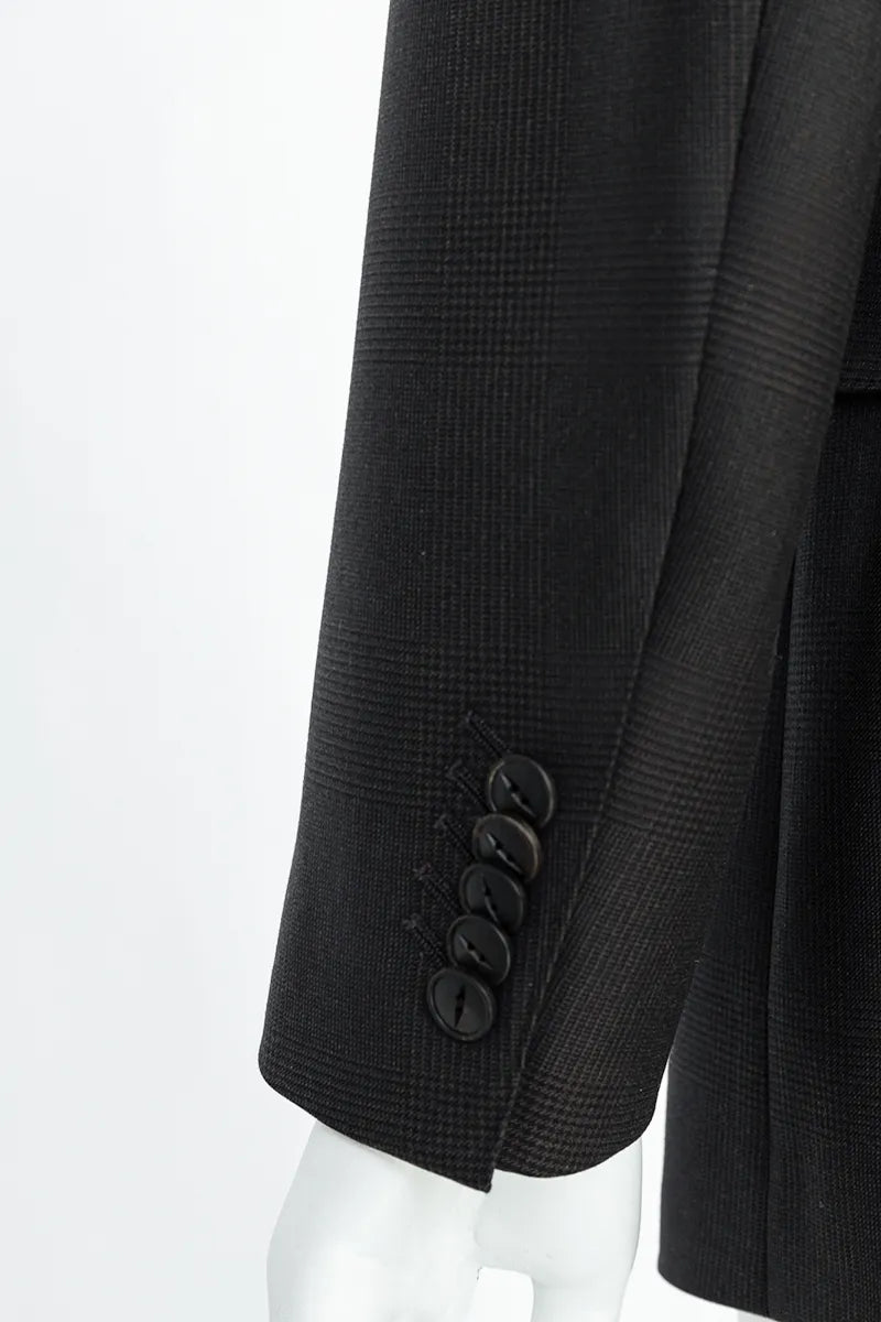 Black coat with button details on a white background italian vbc farbric 