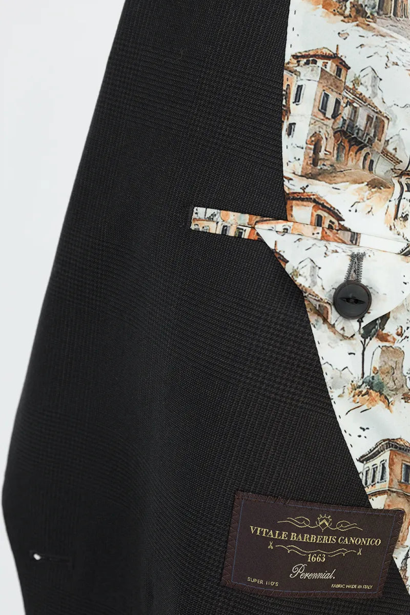 Black sweater with a brand label on a white background