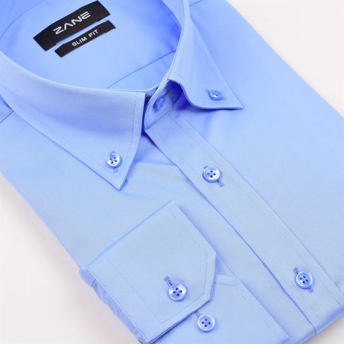 Custom blue dress shirt with detailed collar and cuff by Zane